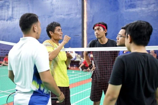 indonesian badminton players celebrating